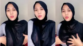 Tante Berjilbab Hitam Menggoda Dengan Balutan Transparan Yang Menggairahkan